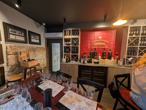 Chateau Tanunda tasting room interior with tables and bottle display